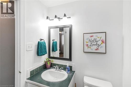 Bathroom featuring vanity and toilet - 48 Riverdale Drive Unit# 2, Hamilton, ON - Indoor Photo Showing Bathroom