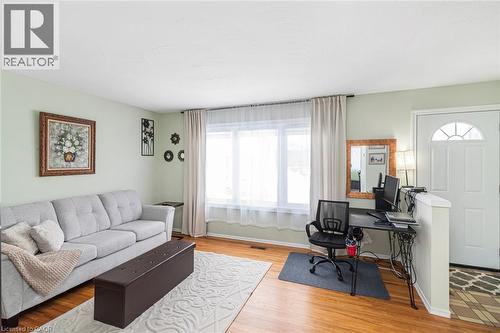 Living room featuring wood finished floors and an office area - 48 Riverdale Drive Unit# 2, Hamilton, ON - Indoor Photo Showing Living Room