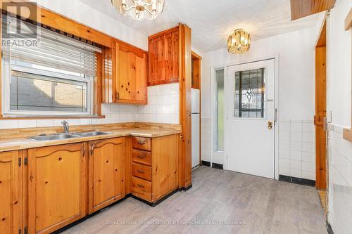 28 Lynvalley Crescent, Toronto, ON - Indoor Photo Showing Kitchen With Double Sink
