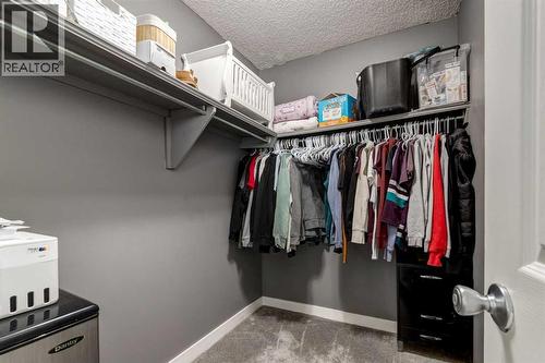 16 Woodgate Close Sw, Calgary, AB - Indoor With Storage