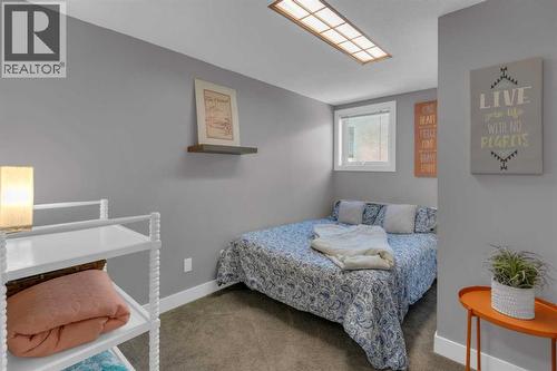 BEDROOM 4 - 40 Hunters Gate, Okotoks, AB - Indoor Photo Showing Bedroom