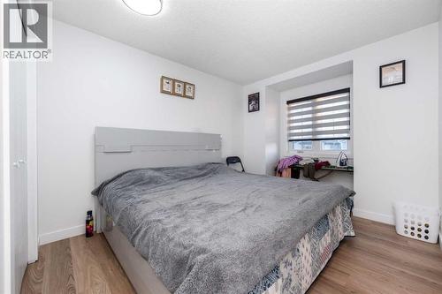 133 Woodbrook Road Sw, Calgary, AB - Indoor Photo Showing Bedroom