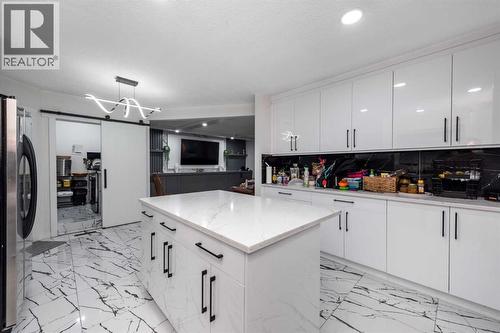 Main Kitchen - 133 Woodbrook Road Sw, Calgary, AB - Indoor Photo Showing Kitchen