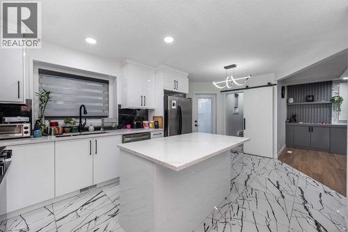 133 Woodbrook Road Sw, Calgary, AB - Indoor Photo Showing Kitchen