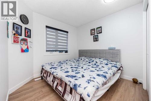 133 Woodbrook Road Sw, Calgary, AB - Indoor Photo Showing Bedroom