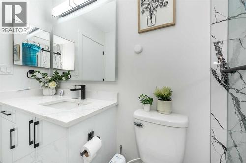 133 Woodbrook Road Sw, Calgary, AB - Indoor Photo Showing Bathroom