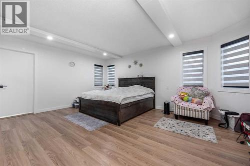133 Woodbrook Road Sw, Calgary, AB - Indoor Photo Showing Bedroom