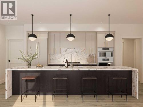 811, 101H Stewart Creek Rise, Canmore, AB - Indoor Photo Showing Kitchen With Upgraded Kitchen