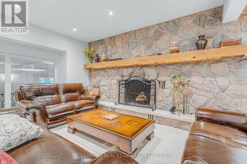 2600 17Th Sideroad, King, ON - Indoor Photo Showing Living Room With Fireplace