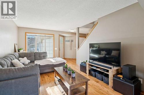 56 West Terrace Road, Cochrane, AB - Indoor Photo Showing Living Room