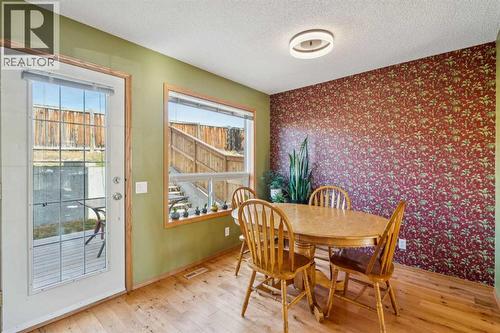 56 West Terrace Road, Cochrane, AB - Indoor Photo Showing Dining Room