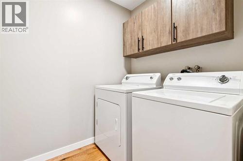 56 West Terrace Road, Cochrane, AB - Indoor Photo Showing Laundry Room