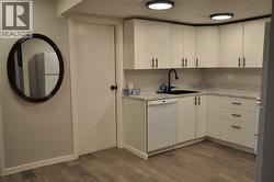 kitchen with entrance into laundry room - 