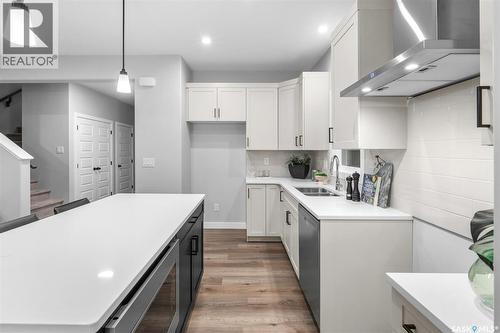 102 Kostiuk Crescent, Saskatoon, SK - Indoor Photo Showing Kitchen With Double Sink