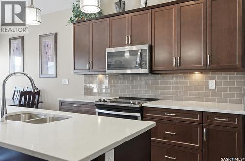 2 433 Palmer Crescent, Warman, SK - Indoor Photo Showing Kitchen With Double Sink With Upgraded Kitchen