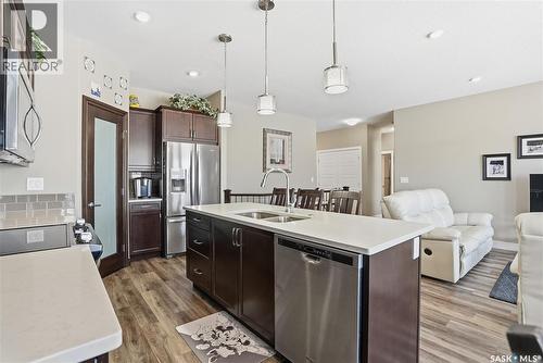 2 433 Palmer Crescent, Warman, SK - Indoor Photo Showing Kitchen With Double Sink With Upgraded Kitchen