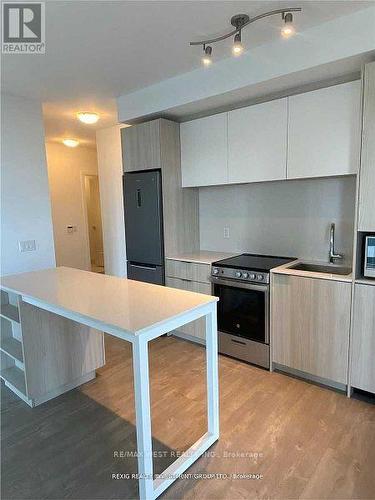 404 - 70 Annie Craig Drive, Toronto, ON - Indoor Photo Showing Kitchen