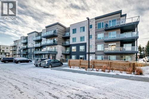 316, 200 Shawnee Square Sw, Calgary, AB - Outdoor With Balcony With Facade