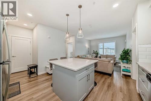 316, 200 Shawnee Square Sw, Calgary, AB - Indoor Photo Showing Kitchen With Upgraded Kitchen