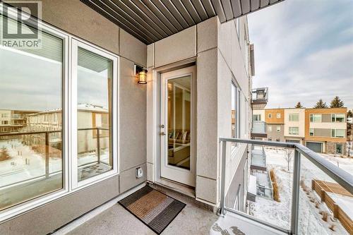 316, 200 Shawnee Square Sw, Calgary, AB - Outdoor With Balcony With Exterior