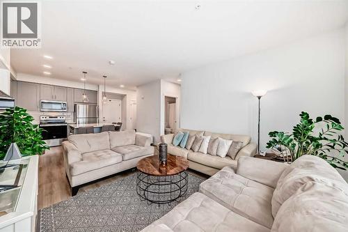 316, 200 Shawnee Square Sw, Calgary, AB - Indoor Photo Showing Living Room