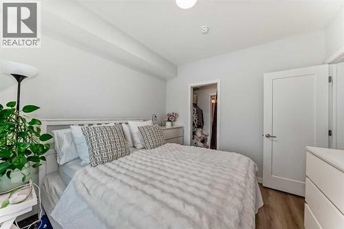 316, 200 Shawnee Square Sw, Calgary, AB - Indoor Photo Showing Bedroom
