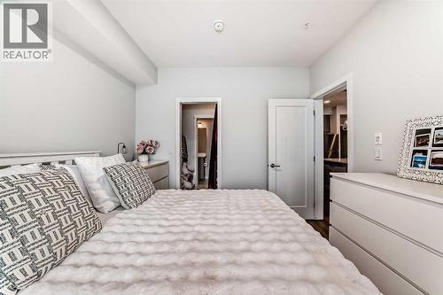 316, 200 Shawnee Square Sw, Calgary, AB - Indoor Photo Showing Bedroom