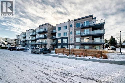 316, 200 Shawnee Square Sw, Calgary, AB - Outdoor With Balcony With Facade
