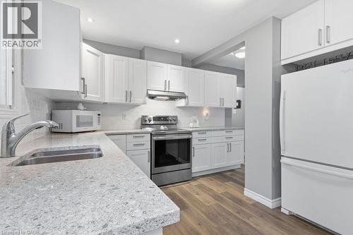 5119 Cherryhill Crescent, Burlington, ON - Indoor Photo Showing Kitchen With Double Sink
