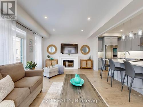 58 Elkington Crescent, Whitby, ON - Indoor Photo Showing Living Room With Fireplace