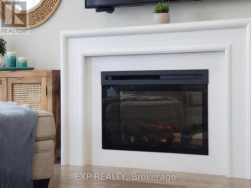 58 Elkington Crescent, Whitby, ON - Indoor With Fireplace