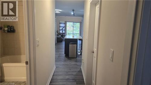 Open concept breakfast area with view of great room to the patio - 115 South Creek Drive Unit# 15D, Kitchener, ON - Indoor Photo Showing Bathroom