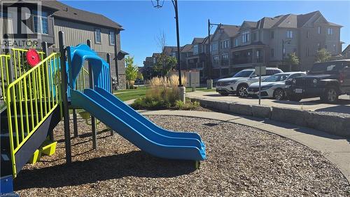 Exclusive playground near the mail boxes with a residential view - 115 South Creek Drive Unit# 15D, Kitchener, ON - Outdoor