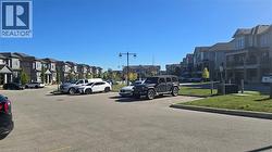 View parking lot with abundant visitor's parking area - 