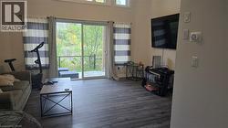 Living room with dark wood-style floors - 