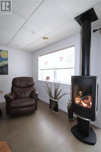 21 Lakeshore Drive, Pasadena, NL - Indoor With Fireplace