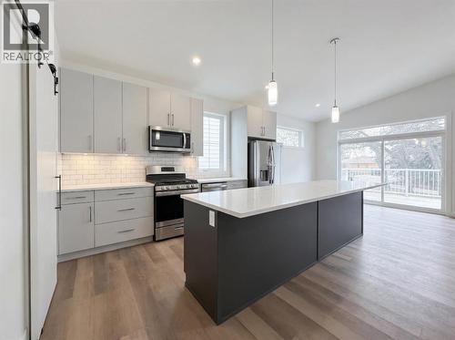 AI completed - 1612 Sixmile View  S, Lethbridge, AB - Indoor Photo Showing Kitchen With Upgraded Kitchen