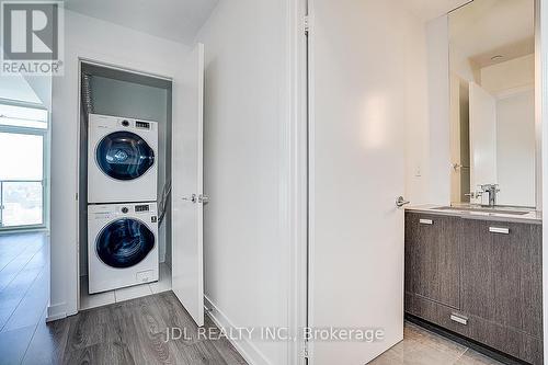 808 - 10 De Boers Drive, Toronto, ON - Indoor Photo Showing Laundry Room