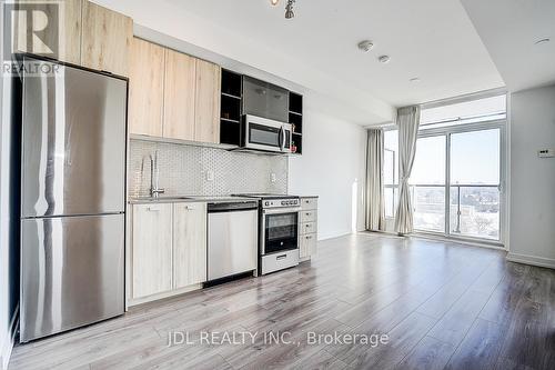 808 - 10 De Boers Drive, Toronto, ON - Indoor Photo Showing Kitchen With Stainless Steel Kitchen