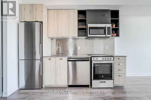 808 - 10 De Boers Drive, Toronto, ON - Indoor Photo Showing Kitchen With Stainless Steel Kitchen With Upgraded Kitchen