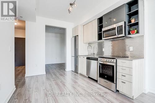 808 - 10 De Boers Drive, Toronto, ON - Indoor Photo Showing Kitchen With Stainless Steel Kitchen With Upgraded Kitchen
