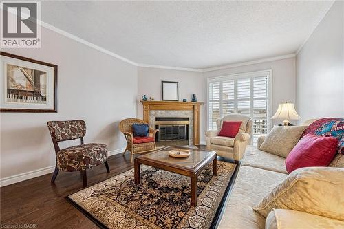 205 Highland Crescent Unit# 32, Kitchener, ON - Indoor Photo Showing Living Room With Fireplace