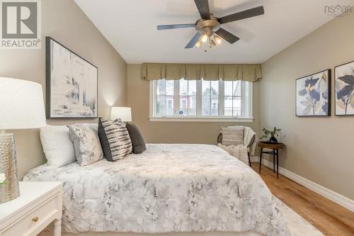 Brand new laminate flooring on lower level - 5411 Saunders Lane, Halifax, NS - Indoor Photo Showing Bedroom