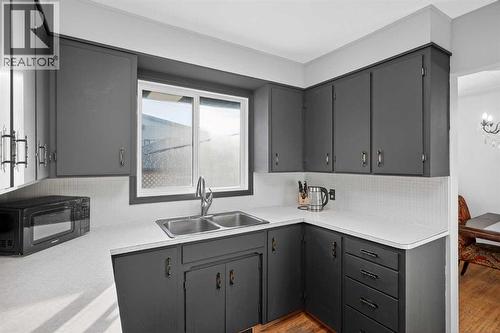 4112 19 Street Nw, Calgary, AB - Indoor Photo Showing Kitchen With Double Sink