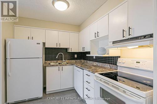 306 - 80 Athol Street E, Oshawa (Central), ON - Indoor Photo Showing Kitchen With Double Sink