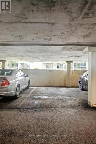 Reserved Covered Parking! - 809 - 127 Belmont Drive, London South (South O), ON - Indoor Photo Showing Garage