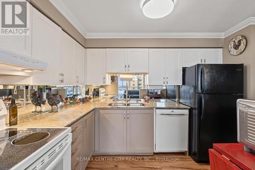 Superb Renovated kitchen with granite countertop - 809 - 127 Belmont Drive, London South (South O), ON - Indoor Photo Showing Kitchen With Double Sink