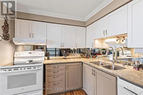 Timeless Shaker Cabinetry - 809 - 127 Belmont Drive, London South (South O), ON - Indoor Photo Showing Kitchen With Double Sink
