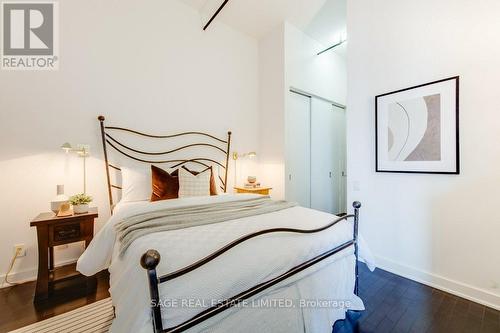 walk through double closets to en suite bathroom - 521 - 43 Hanna Avenue, Toronto, ON - Indoor Photo Showing Bedroom