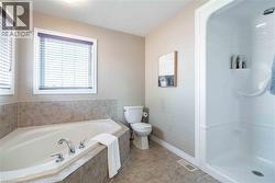 Alternate view showing corner spa tub and separate shower - 